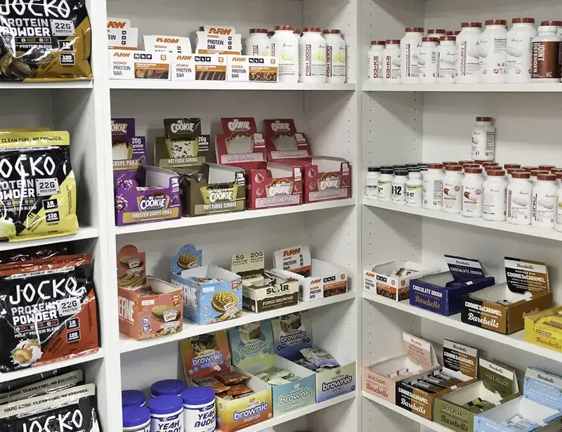 Vitamins, supplements and protein products on the shelves at Forza Nutrition